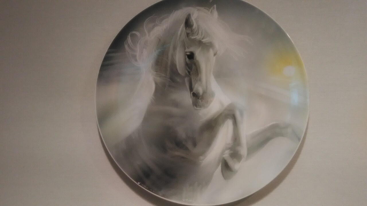 Porcelain plate with horse painting