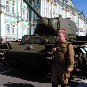Russian soldier infront of tank